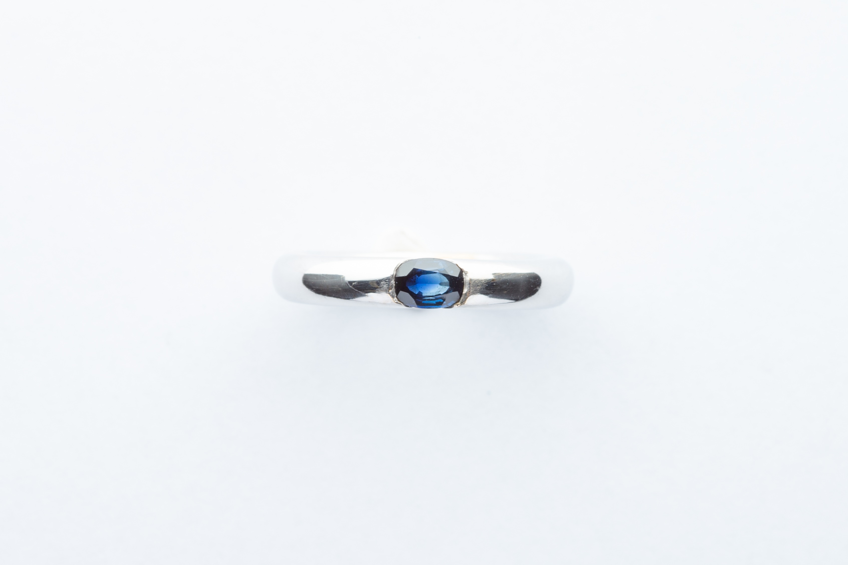 A Cartier 18ct White Gold & Blue Oval Sapphire Ring,