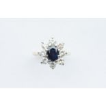 A Gold Sapphire & Diamond Daisy Cluster Ring,