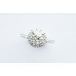 A 18ct White Gold Diamond Halo Ring,