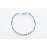 A 9ct Yellow Gold Rhodium Plated Diamond Line Braclet,