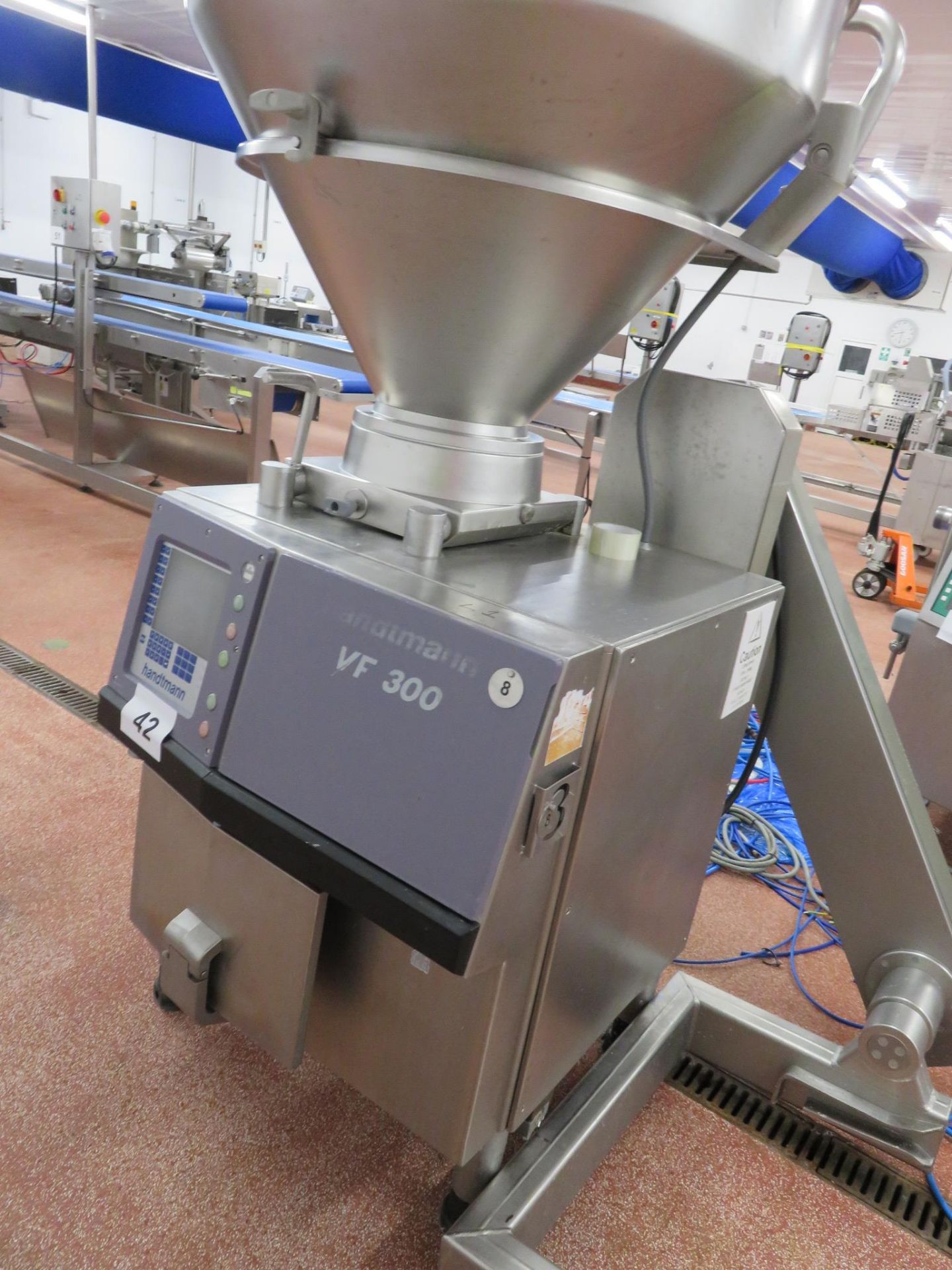 HANDTMANN VF300 VACUUM FILLER WITH LOADER.