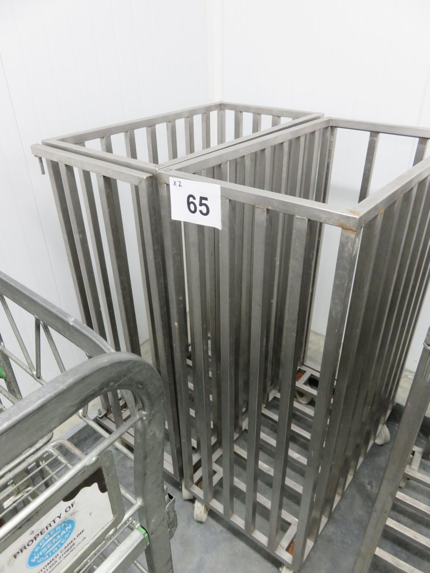 2 X UNITECH MOBILE CAGES/TROLLEYS.