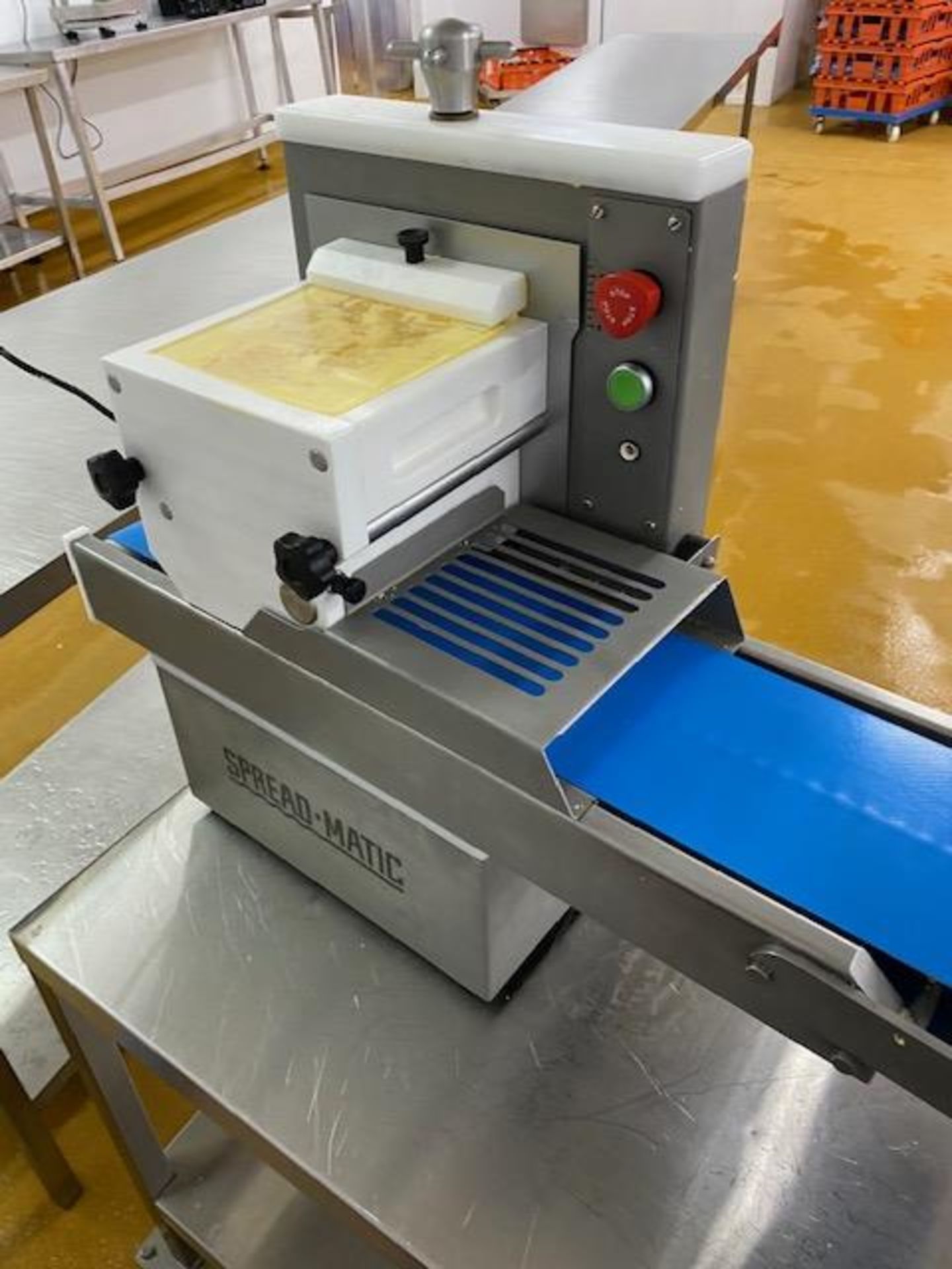 SPREAD-MATIC BUTTERING MACHINE.