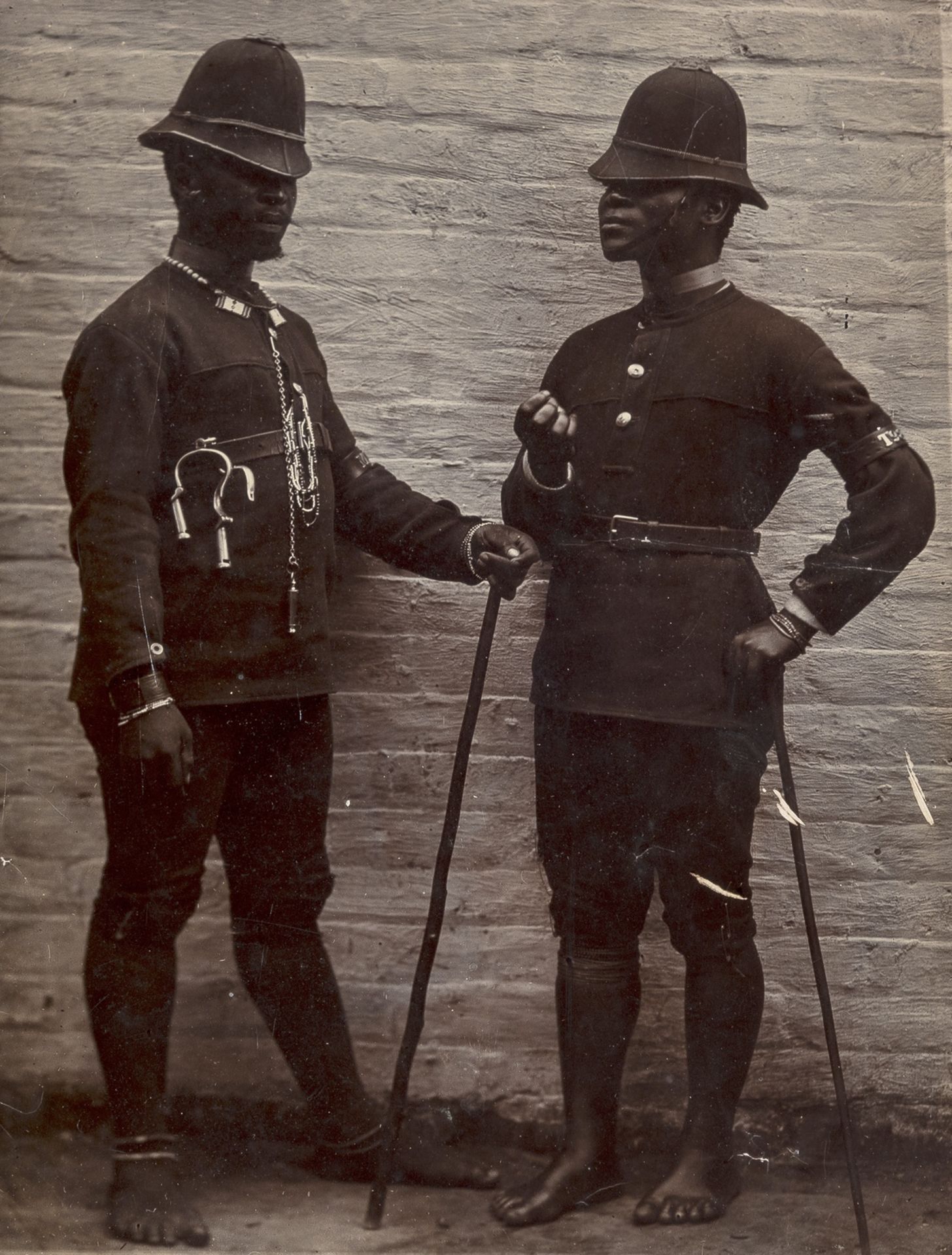 Photographs.- Unidentified Photographer. Two Colonial Policemen, printing-out-paper print, 1890 & …