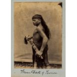 Photographs.- Borneo.- Unidentified Photographer. Dayak headhunter of Borneo carrying a mandau …