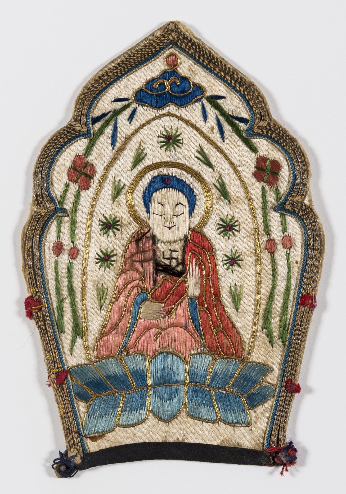 Buddhism.- A panel from a Sinicized Tibetan Buddhist ritual crown, embroidered in silk, [?18th …