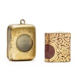 Miniature book.- Miniature book in Hindi, ornately gilt, housed in a metal box with inset …