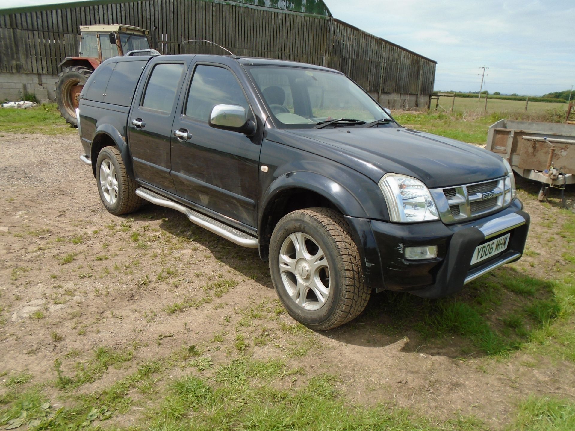 2006 Isuzu Rodeo pickup with canopy, YD06 MHM, 3.0l diesel, 126,500 miles, recent new tires, 10