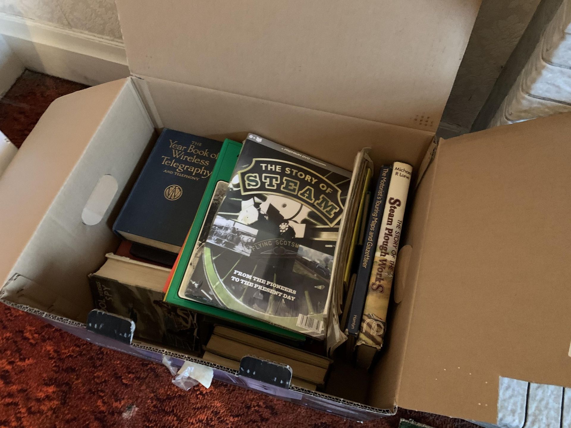 Box of books inc vintage tractor