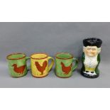 Set of three Scottish pottery terracotta mugs by Wenda Friskin , together with an Adams Toby jug