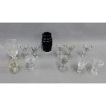 A quantity of 19th century penny lick glasses, an amber coloured glass barrel and a wine glass, (a