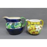 Two Bough Scottish pottery jugs, both by Richard Amour and painted with fruit and flowers, with
