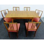 Gordon Russell walnut dining table and set of six spar back chairs, (7)