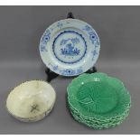 Set of green glazed Wedgwood leaf moulded plates, an early Delft blue and white plate and a peal