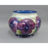 Moorcroft vase, tubeline decorated with pansy pattern, facsimile signature and impressed back