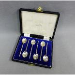 A cased set of six Walker & Hall silver coffee spoons, Sheffield 1951