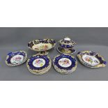 English dessert service with blue borders, gilt edged rims and hand painted floral sprays comprising