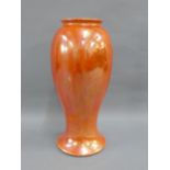 Ruskin high shouldered baluster vase with an orange lustre glaze, with impressed backstamps, 27.5 cm