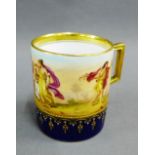 Vienna type porcelain mug, with painted figural scene, blue border and gilt edge rims, has a blue