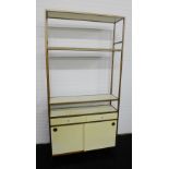 Julian Chichester burnished brass framed bookcase / display shelves, with two open shelves over