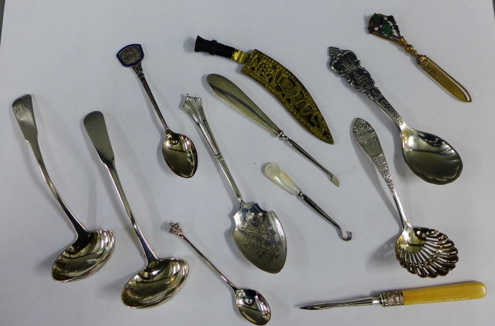 A collection of silver, white metal and brass spoons and ladles, etc (a lot)