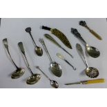 A collection of silver, white metal and brass spoons and ladles, etc (a lot)