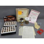 A collection of ephemera and coins to include a Ration Book, Penny Farthing Collector's set, etc (