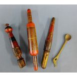 Collection of three Indian wooden painted sweet making utensils and a wooden spoon, (4)