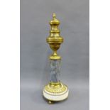 Ormolu and hardstone candlestick with detachable cover and raised on three feet, size overall 31cm