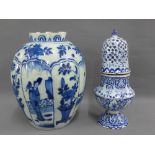 Delft blue and white lobbed baluster vase painted with figures and flowers, 22cm high, together with