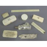 A quantity of early 20th century ivory and bone items to include boxes of various size, rulers, a