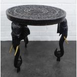 Ebonised hardwood table with carved elephant legs, 56 x 54cm