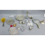 Collection of white metal items to include a salver, strainer, chain purse, decanter label, Iona