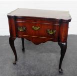 19th century mahogany tea table with moulded fold over top opening to a void interior above a