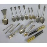 A collection of Georgian and Victorian Edinburgh silver spoons with mixed makers and dates, together