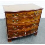 Mahogany bow front chest of small proportions, with four graduating long drawers and bracket feet,