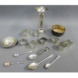 A collection of silver items to include napkin rings, salt spoons, sugar bowl and armada dish,