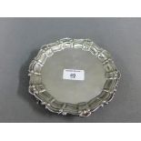 Silver card tray with shell border, Birmingham 1972, 17cm diameter