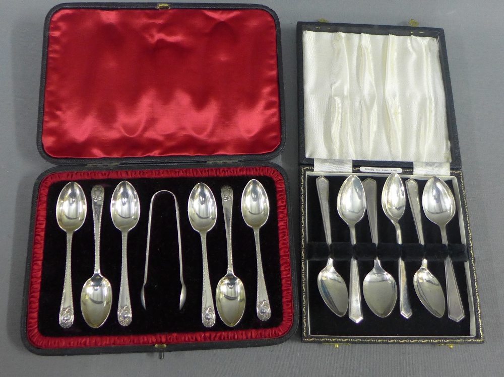 A cased set of six London silver teaspoons and sugar tongs together with a cased set of six