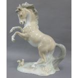 Spanish porcelain rearing Horse figure, 24cm high