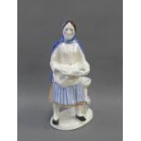 C & SO, pottery figure of a Fishwife, 18cm high