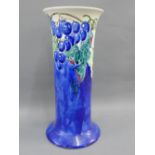Bough Scottish pottery vase, the blue ground painted with fruit and vine by Elizabeth Amour, with