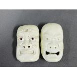 Two late 19th century / early 20th century carved Japanese noh masks / perhaps Netsuke, 6.5cm