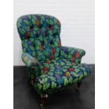 Button back upholstered armchair on castors, 102 x 85cm