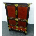 Chinoiserie style cabinet, the four cupboard doors and two short drawers with brass strapwork, 126 x