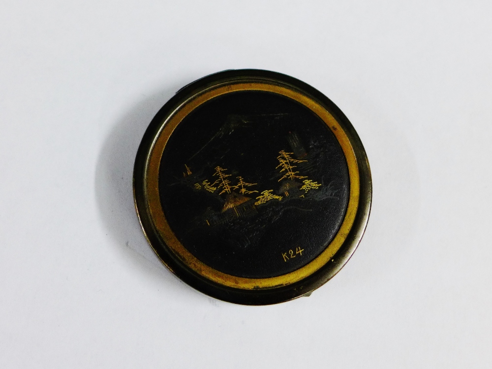 Komai type mixed metal compact with a scene of Mount Fuji to the hinged lid, marked K24, 5cm