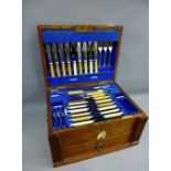 Early 20th century oak canteen containing a suite of Epns Walker & Hall flat ware, contained over