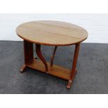 Arts & Crafts oak leaf table of small proportions, 47 x 62cm