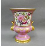 Derby campana vase with hand painted floral sprays to a pink and gilt ground on a circular foot rim,