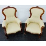 Pair of Victorian mahogany armchairs with foliate carved cresting and upholstered backs and seats,